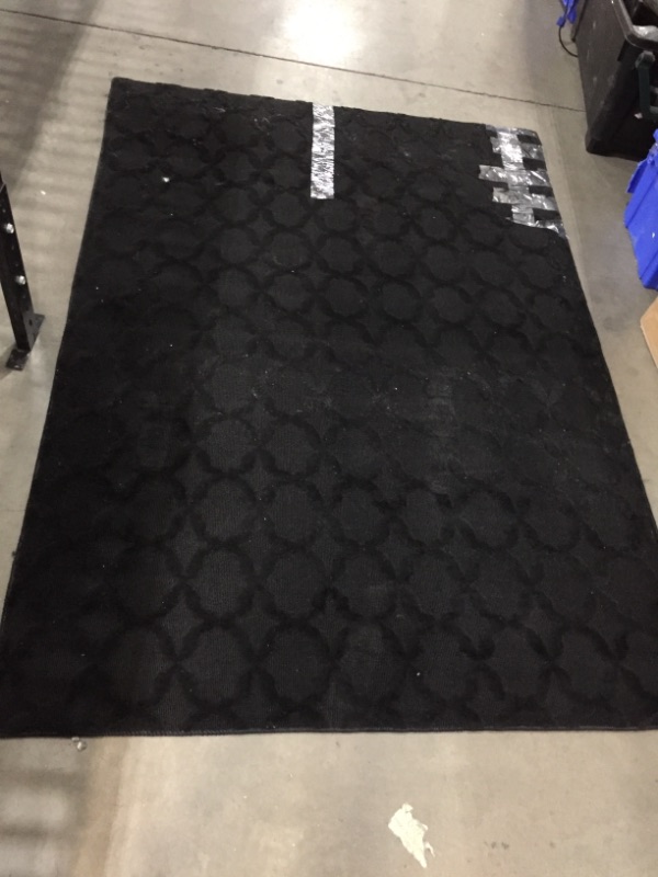 Photo 1 of 7' x 5' black area rug