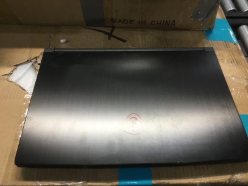 Photo 7 of NOT FUNCTIONAL 
READ CLERK COMMENTS PLEASE
MSI GF65 Thin 10UE-047 15.6 "144Hz 3ms Gaming Laptop Intel Core i7-10750H RTX3060 16GB 512GB NVMe SSD Win10
