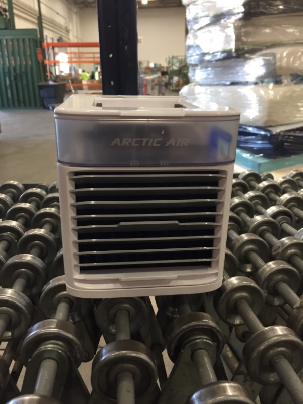 Photo 1 of Ontel Arctic Air Pure Chill Evaporative Ultra Portable Personal Air Cooler with 4-Speed Air Vent ***MISSING PLUG***