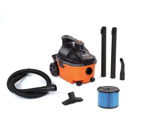 Photo 1 of 4 Gallon 5.0-Peak HP Portable Wet/Dry Shop Vacuum with Fine Dust Filter, Hose and Accessories
