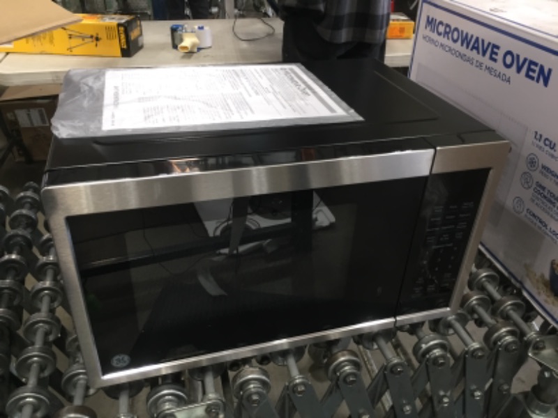 Photo 2 of GE 0.9 cu. ft. Countertop Microwave in Stainless Steel