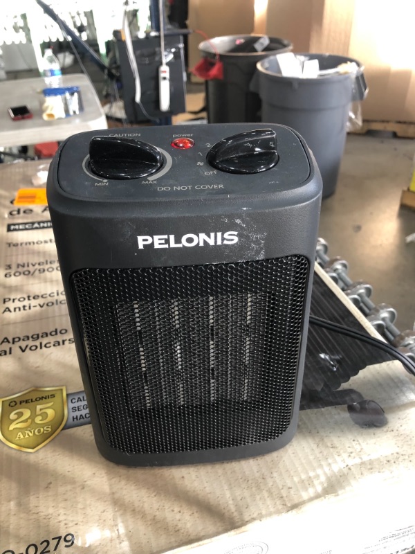 Photo 4 of BUNDLE, Pelonis 1500-Watt 9 in. Electric Personal Ceramic Space Heater with Thermostat, Black
**USED**
AND, 350-Watt Wall Outlet Handy Heater, Black
