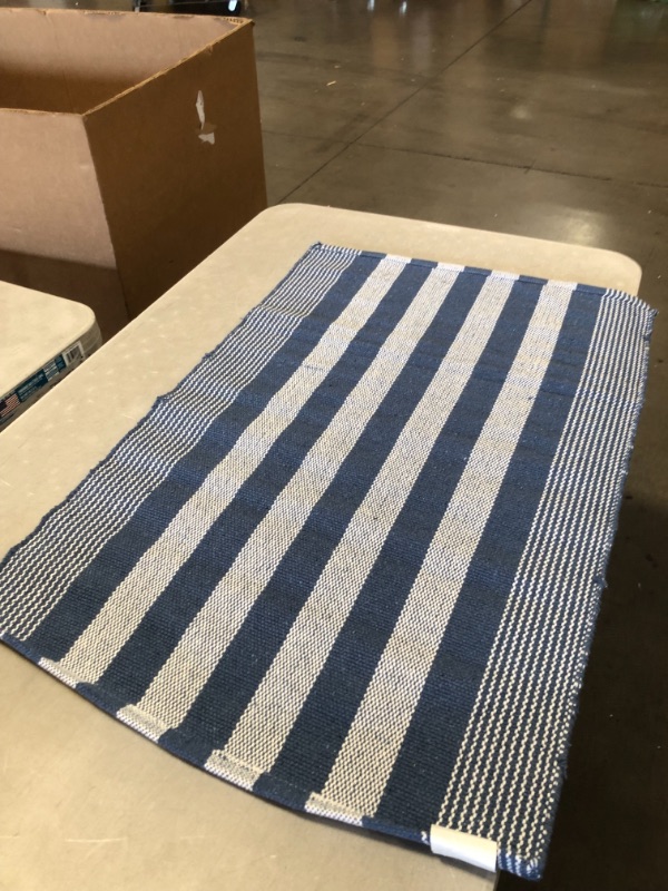 Photo 2 of 28" X 34.5" AREA RUG BLUE AND WHITE STRIPED, PLEASE SEE PHOTOS 