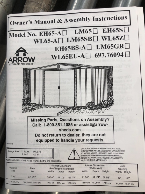 Photo 4 of Arrow Shed Arrow Woodridge Low Gable Steel, Coffee/Woodgrain
//SOME PARTS ARE DENTED //LOOSED COMPONENTS 
