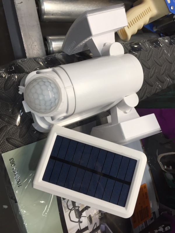 Photo 2 of Defiant 180-Degree White Solar Powered Motion LED Security Light with Battery Backup