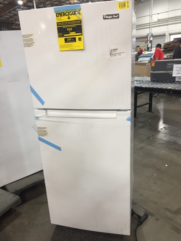 Photo 1 of *Damage shown in pictures*
Magic Chef 10.1 Cu. Ft. Top Freezer Refrigerator in White.
