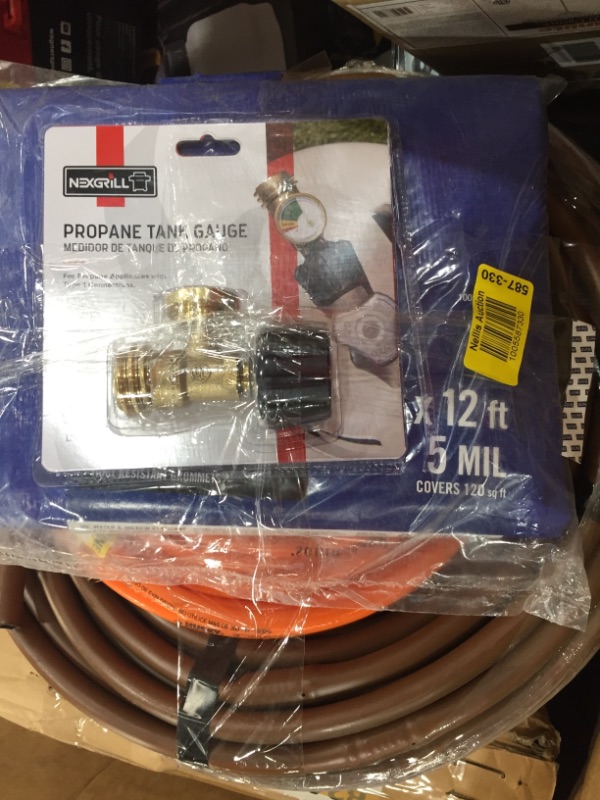 Photo 2 of *Final sale* *No returns* *No refunds*
New/Used items.
Assortment of grill hoses, lawn hoses, vales, a shade cover.