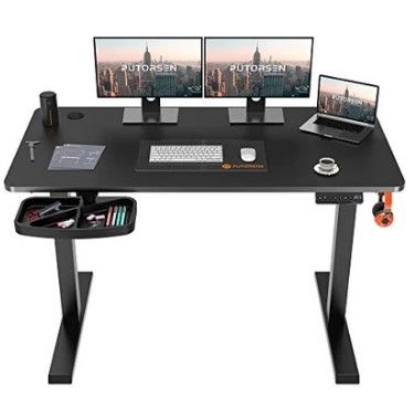 Photo 1 of PUTORSEN Electric Height Adjustable Standing Desk,Sit Stand Home Office Table with Splice Board, Black Frame/Black Top Stand Up Computer Desk with Memory Preset Controller