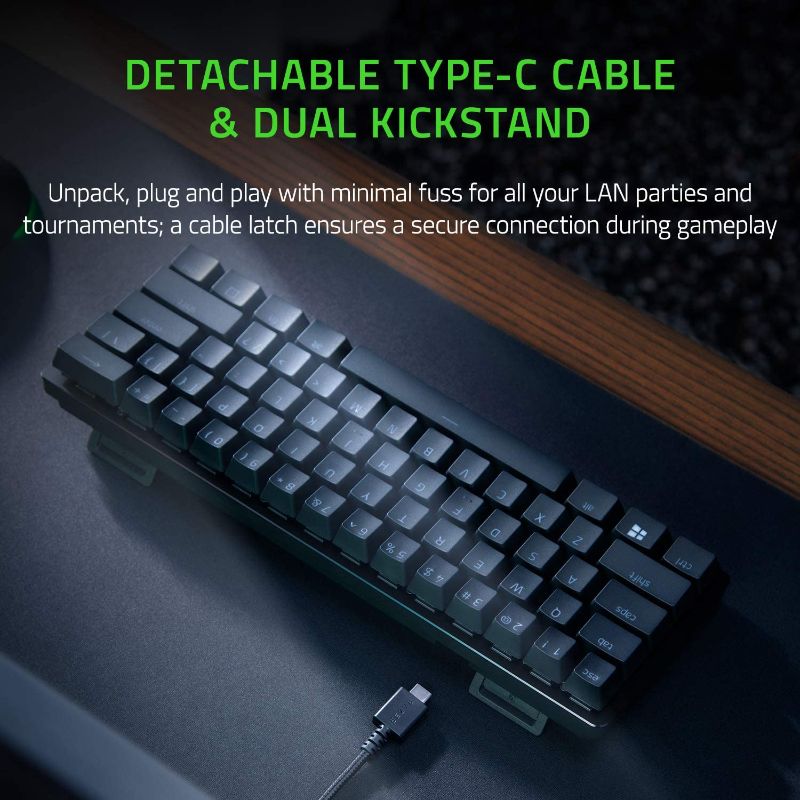 Photo 1 of Razer Huntsman Mini 60% Gaming Keyboard: Fastest Keyboard Switches Ever - Clicky Optical Switches - Chroma RGB Lighting - PBT Keycaps - Onboard Memory - Classic Black
