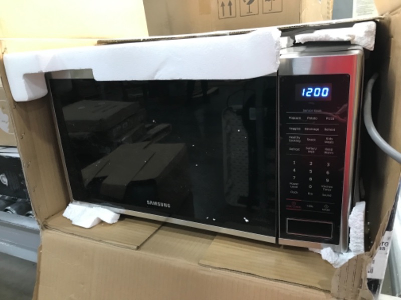 Photo 5 of PARTS ONLY** DOOR IS JAMMED SHUT**
Samsung MS14K6000AS/AA MS14K6000 speed-cooking-microwave-ovens, 1.4 cu. ft, Stainless Steel
