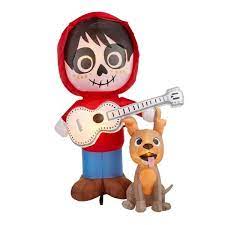 Photo 1 of 6.5 ft. Coco Miguel with Guitar and Dante Scene Airblown Disney Halloween Inflatable
