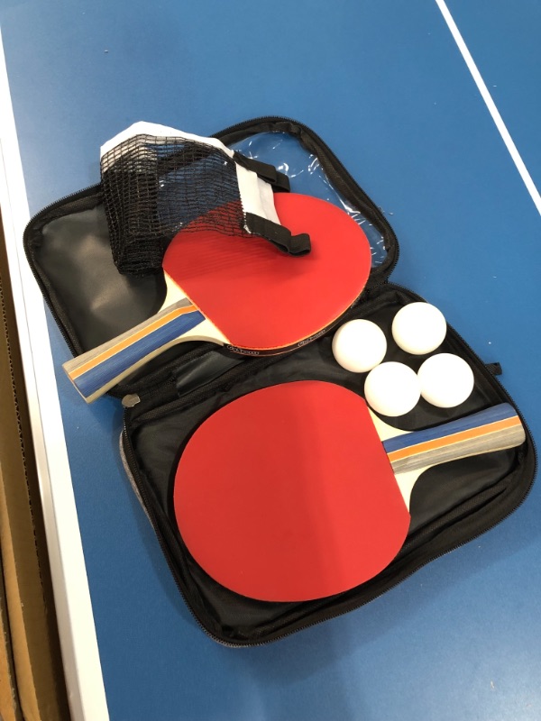 Photo 4 of *SEE last picture for damage*
GoSports Mid-Size Table Tennis Game Set - Indoor/Outdoor Portable Table Tennis Game with Net, 2 Table Tennis Paddles and 4 Balls
