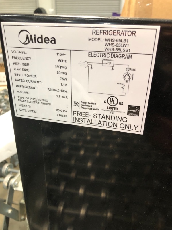 Photo 4 of *SEE last picture for damage*
Midea WHS-65LB1 Compact Single Reversible Door Refrigerator, 1.6 Cubic Feet (0.045 Cubic Meter), Black
