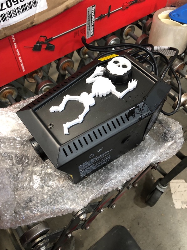 Photo 1 of *USED*
Home Accents Holiday 4.8 in. 400-Watt Coffin Skeleton Fog Machine