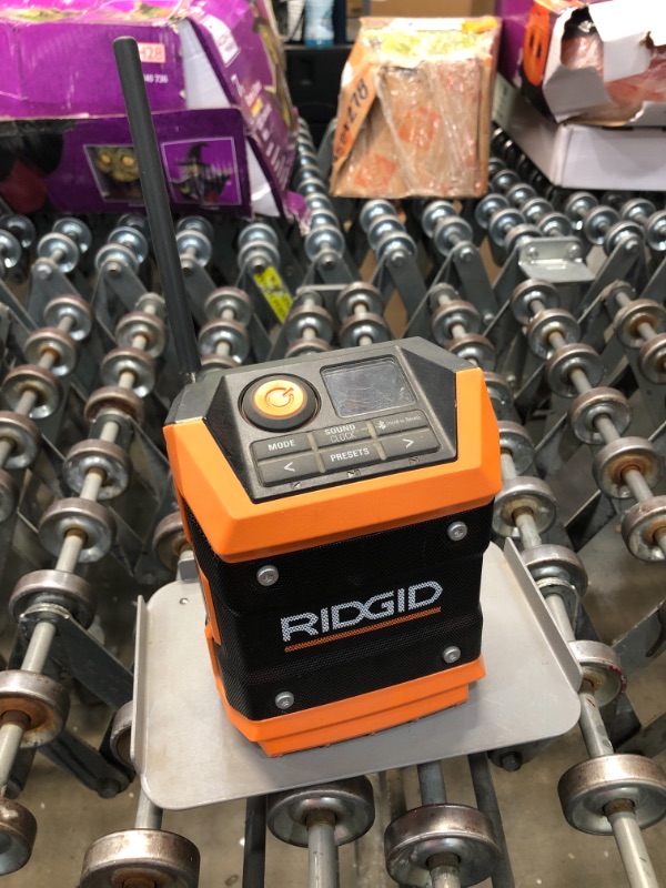 Photo 2 of *USED*
Ridgid R84086B 18V Lithium Ion Cordless Mini Bluetooth Radio w/ Clock and USB Smart Phone Charging (Battery and Charger Not Included / Radio Only)
