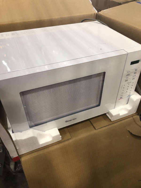 Photo 2 of *SEE last picture for damage*
Magic Chef 1.1 cu. ft. Countertop Microwave in White
