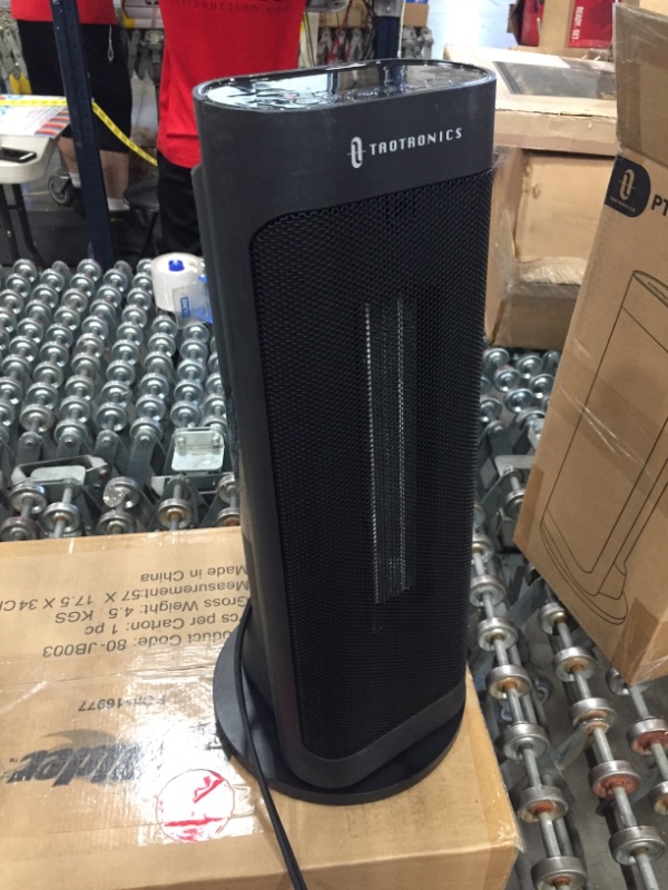 Photo 1 of *MISSING manual* 
Space Heater, TaoTronics PTC 1500W Fast Quiet Heating Ceramic Tower Heater Oscillating Portable Heater with Remote Control Programmable Thermostat ECO Mode 12H Timer LED Display
