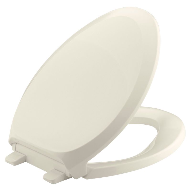 Photo 1 of KOHLER French Curve Elongated Quiet Closed Toilet Seat in Almond, Brown
