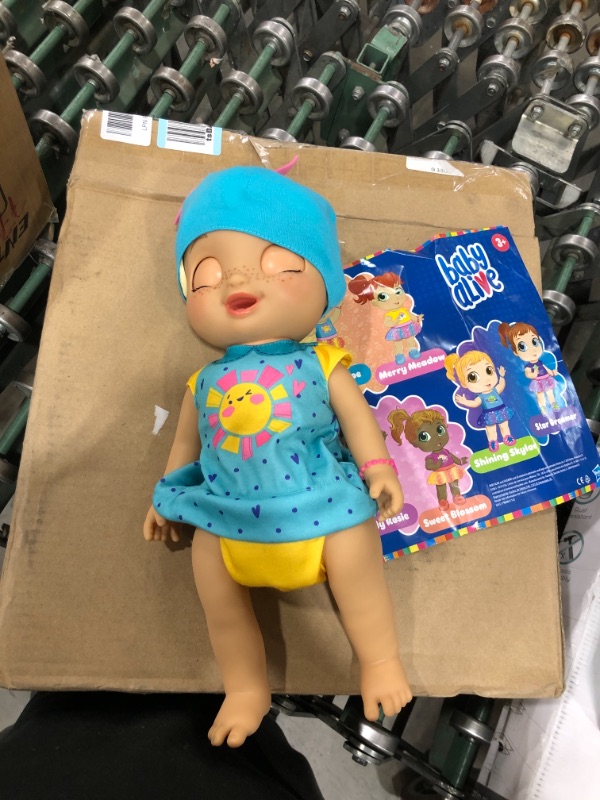 Photo 2 of Baby Alive Baby Grows Up (Happy) - Happy Hope or Merry Meadow, Growing and Talking Baby Doll, Toy with 1 Surprise Doll and 8 Accessories
