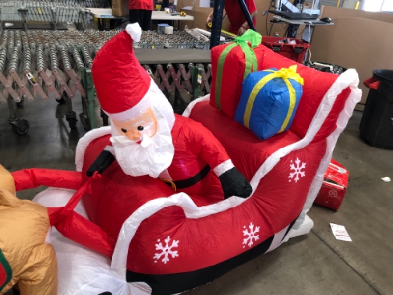 Photo 3 of 8ft. Cute Christmas Inflatable Santa Claus on Sleigh with Two Reindeer
