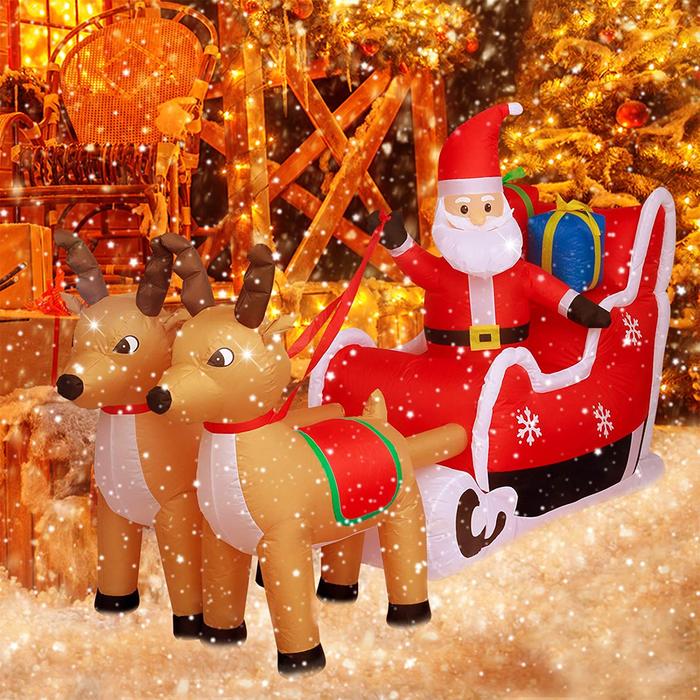 Photo 1 of 8ft. Cute Christmas Inflatable Santa Claus on Sleigh with Two Reindeer
