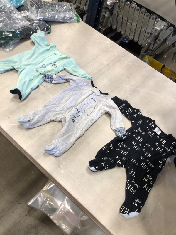 Photo 1 of *MISSING 1 pair of pajamas* 
Gerber Baby Boy Sleep 'N Play Footed Pajamas, 4-Pack, Preemie 
