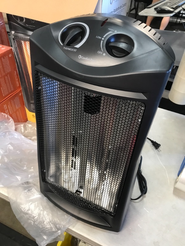 Photo 2 of *MISSING manual* 
Comfort Zone 1500-Watt Electric Quartz Infrared Radiant Tower Heater Space Heater