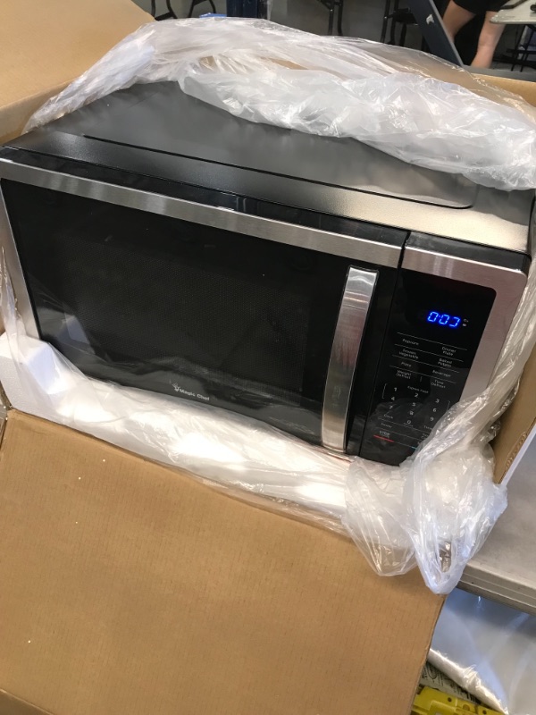 Photo 2 of *USED*
Magic Chef 1.6 cu. ft. Countertop Microwave in Stainless steel with Gray Cavity