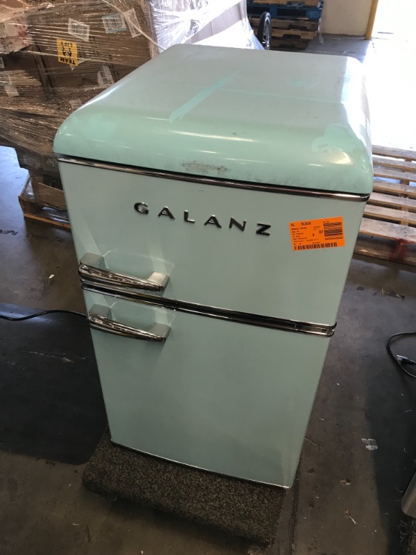 Photo 2 of *SEE last pictures for damage*
Galanz 3.1 cu. ft. Retro Mini Fridge with Dual Door True Freezer in Blue