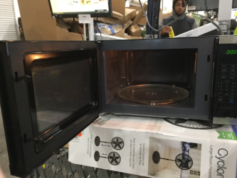Photo 5 of 1.1 cu. ft. Countertop Microwave in Stainless Steel with Gray Cavity
AS IS USED 