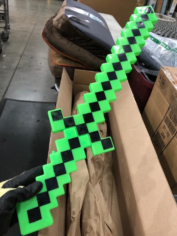 Photo 2 of *USED*
Fun Central LED Light Up Pixel 8-Bit Toy Sword for Kids - Green
