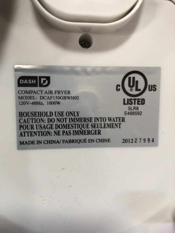 Photo 5 of *SEE last picture for damage*
Dash Compact Air Fryer Oven Cooker with Temperature Control, Non-stick Fry Basket, Recipe Guide + Auto Shut off Feature, 2 Quart - White
