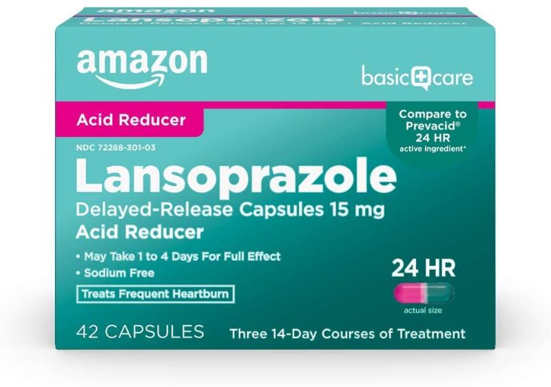 Photo 1 of Amazon Basic Care Lansoprazole Delayed Release Capsules, 15 mg, Proton Pump Inhibitor, Treats Frequent Heartburn, Day or Night, 42 Count Expires March 2023 
