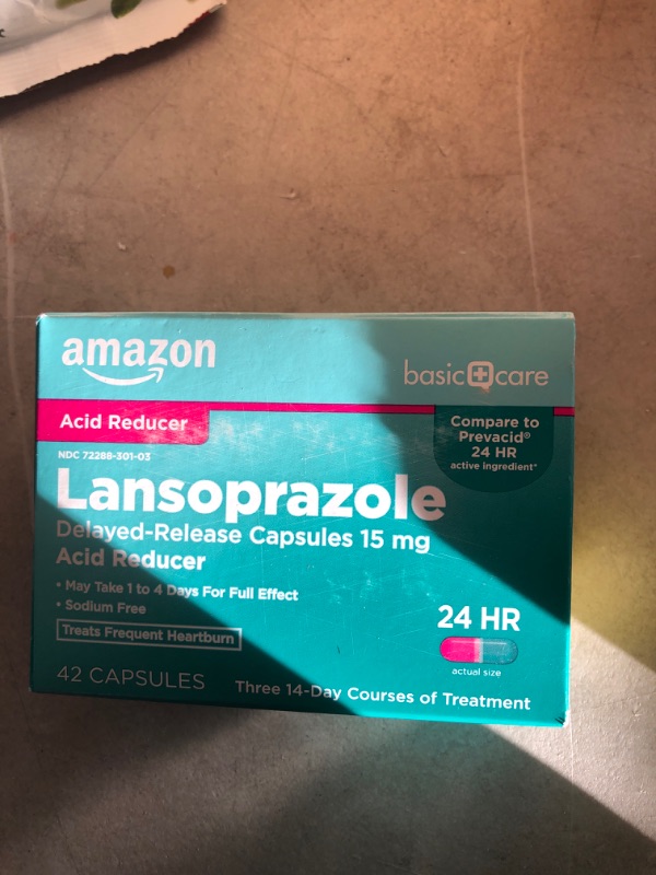 Photo 1 of Amazon Basic Care Lansoprazole Delayed Release Capsules, 15 mg, Proton Pump Inhibitor, Treats Frequent Heartburn, Day or Night, 42 Count Expires March 2023 
