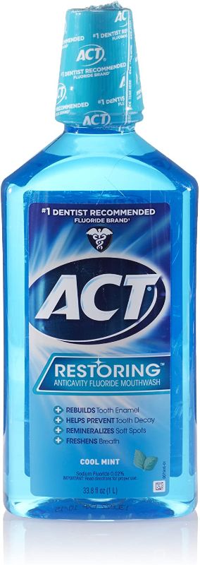 Photo 1 of ACT Restoring Anti-Cavity Fluoride Mouthwash, Cool Mint, 33.8 oz
Expires 2/2024