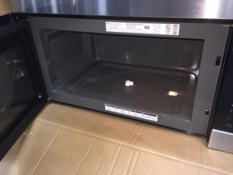 Photo 4 of 1.7 Cu. Ft. Over-the-Range Microwave with EasyClean