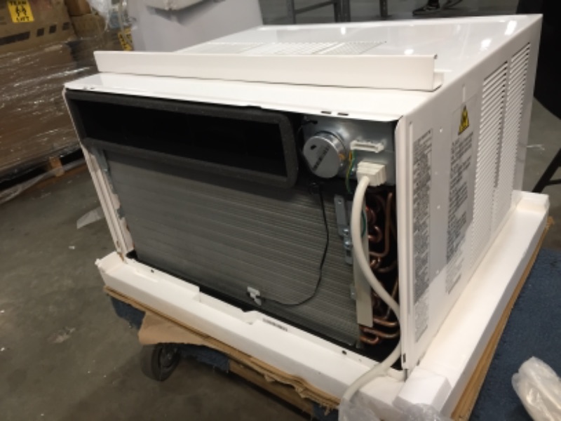 Photo 1 of LG 12,000 BTU 115V Window-Mounted Air Conditioner with Remote Control, White
