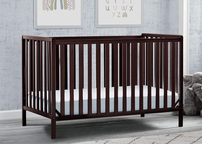 Photo 1 of Delta Children Heartland 4-in-1 Convertible Crib, Dark Chocolate + Delta Children Twinkle Galaxy Dual Sided Recycled Fiber Core Crib 