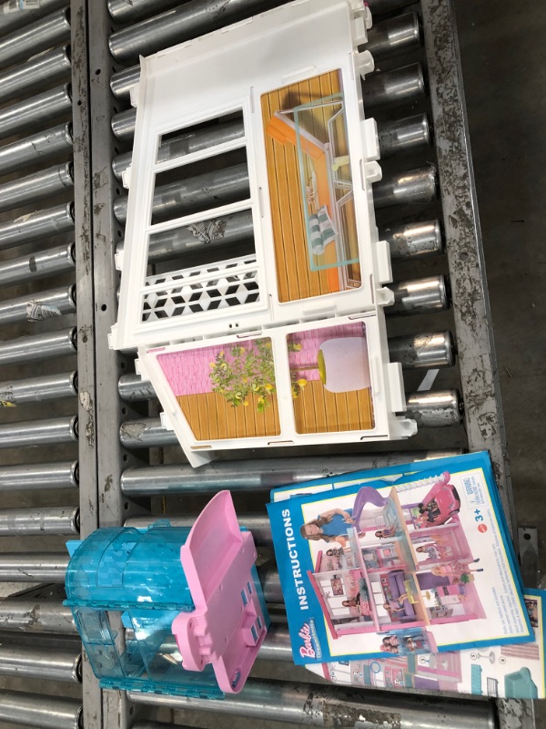 Photo 2 of 
Barbie Dreamhouse Dollhouse with Wheelchair Accessible Elevator, Pool, Slide and 70 Accessories