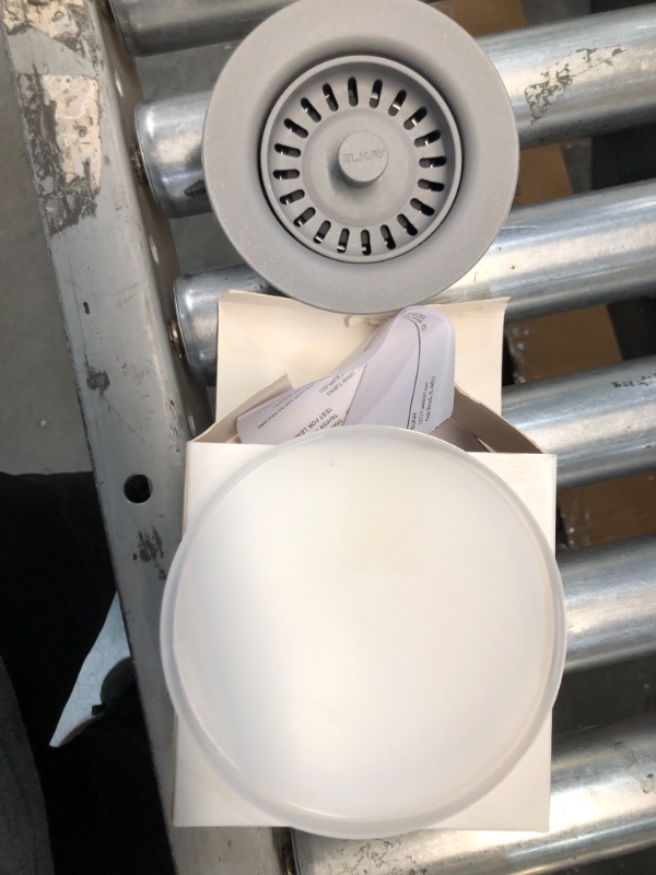 Photo 1 of Elkay Polymer 3-1/2" Disposer Flange with Removable Basket Strainer and Rubber Stopper Greystone