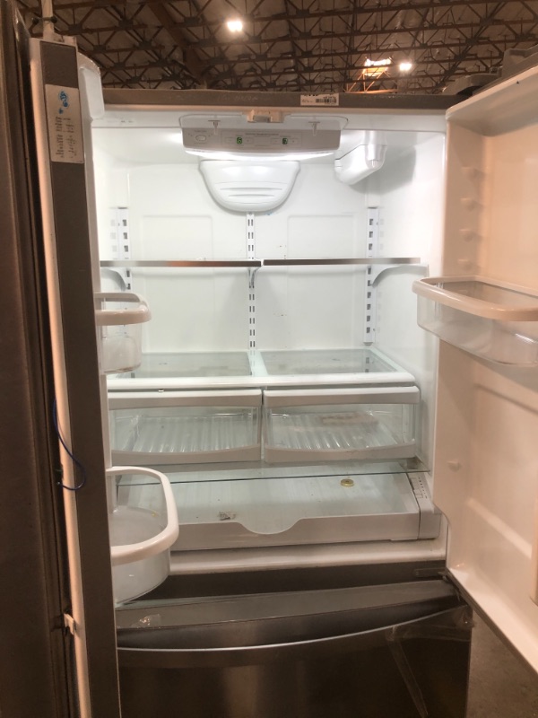 Photo 3 of  DAMAGE***NEEDS CLEANING***25 cu. ft. French Door Refrigerator in Fingerprint Resistant Stainless Steel with Internal Water Dispenser
