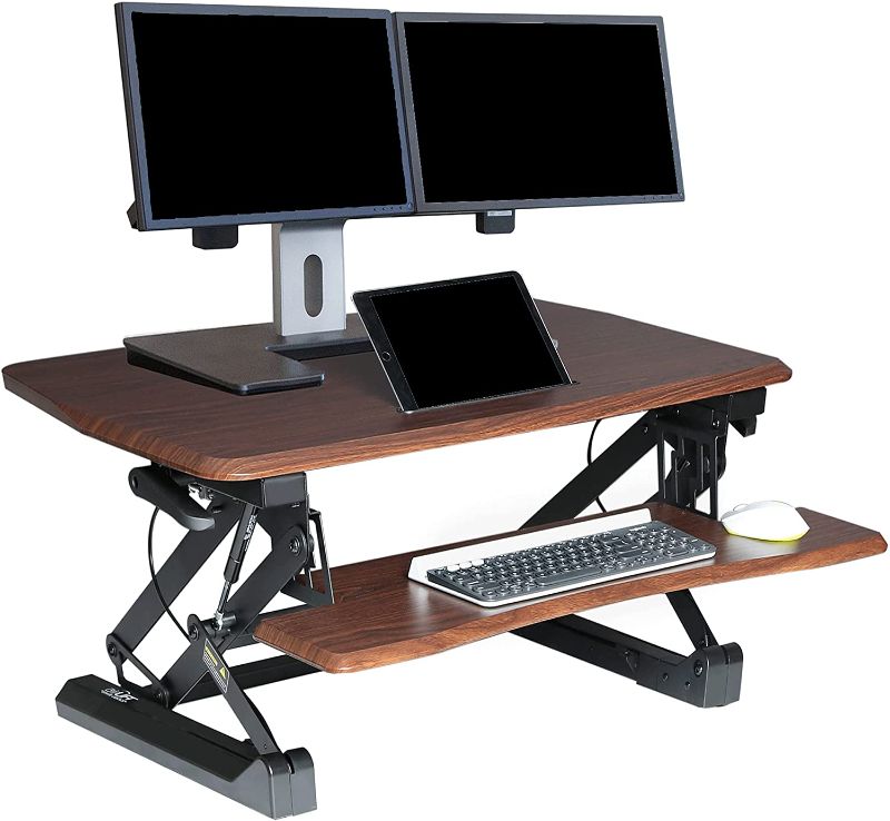 Photo 1 of Seville Classics Airlift Height Adjustable Sit Converter Workstation Standing Ergonomic Dual Monitor Riser Keyboard Tray & Phone/Tablet Holder, Desk 35", Walnut
