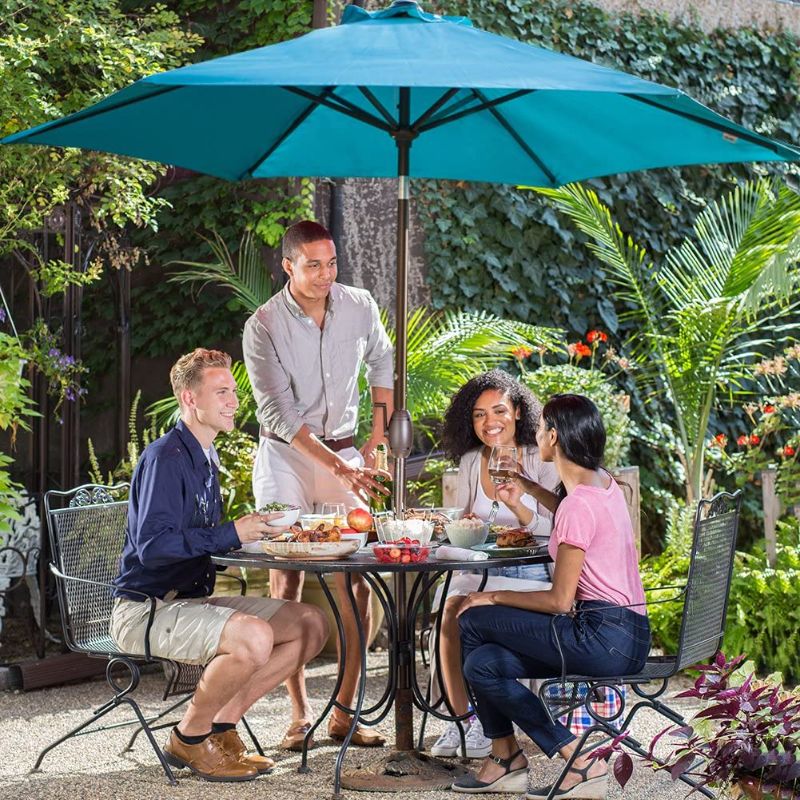 Photo 1 of Abba Patio 9ft Patio Umbrella Outdoor Umbrella Patio Market Table Umbrella with Push Button Tilt and Crank for Garden, Lawn, Deck, Backyard & Pool, Turquoise
