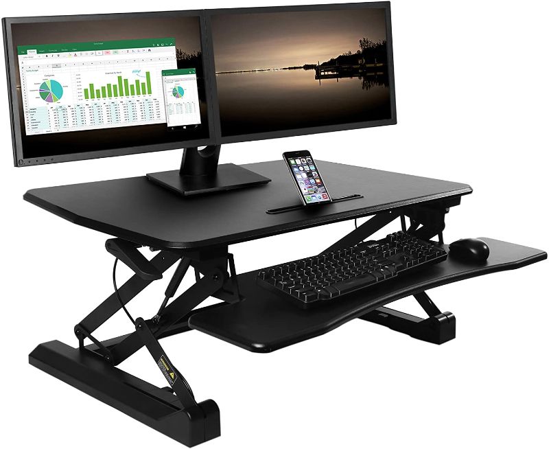 Photo 1 of Seville Classics Airlift Height Adjustable Sit Converter Workstation Standing Ergonomic Dual Monitor Riser Keyboard Tray & Phone/Tablet Holder, Full Desk 35", Black
