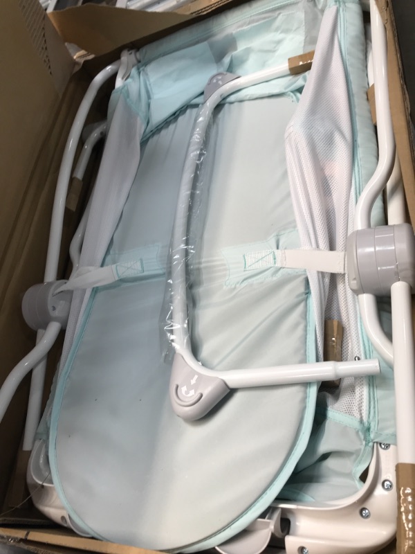 Photo 1 of Fisher-price Rock with Me Bassinet -Pacific Pebble Portable Bassinet with Rocking Motion Soothing Features for Newborns Infants, Multi,,   33.07 x 22.44 x 24.41 inches