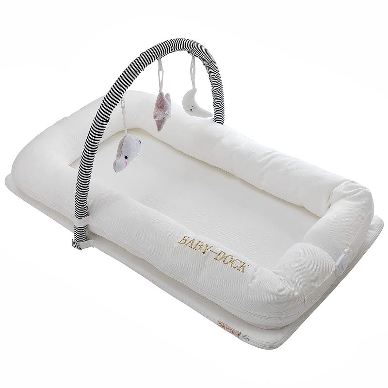 Photo 1 of BABY-DOCK Newborn Lounger Baby Nest for Co-Sleeping - Soft, Breathable - Portable, Multifunctional - Machine Washable - White with a Changeable Cover, 3 Hanging Toys and Carry Bag
