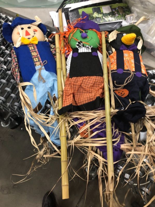 Photo 1 of DECORATIVE 6FT SCARECROWS 
SOLD AS IS
PAIRS OF 3 MAY VERY
