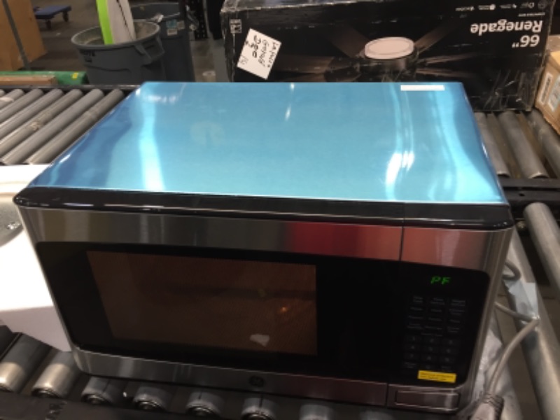 Photo 5 of GE - 1.1 Cu. ft. Mid-Size Microwave - Stainless Steel