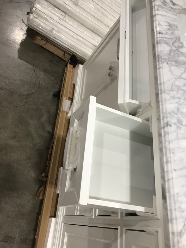 Photo 2 of ** SOLD ON WHOLE PALLET*** NO RETURNS NO REFUNDS***
Windlowe 73 in. W x 22 in. D x 35 in. H Bath Vanity in White with Carrara Marble Vanity Top in White with White Sink
