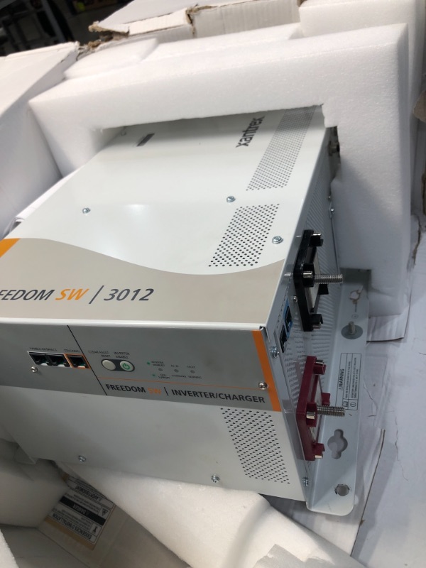 Photo 1 of XANTREX FREEDOM SW3012 12V 3000W INVERTER CHARGER
